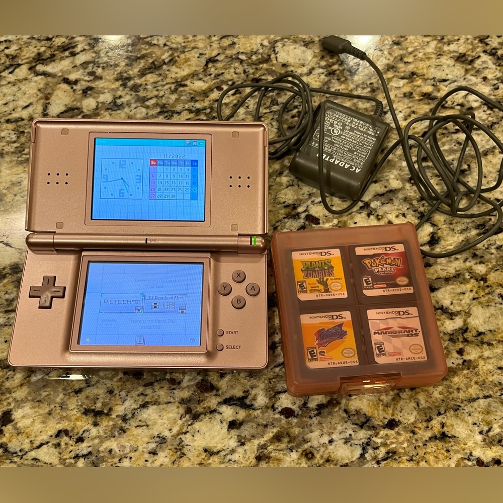 Nintendo DS with 8 games - Pokémon, MarioKart, Kirby, Littlest Pet Shop and more